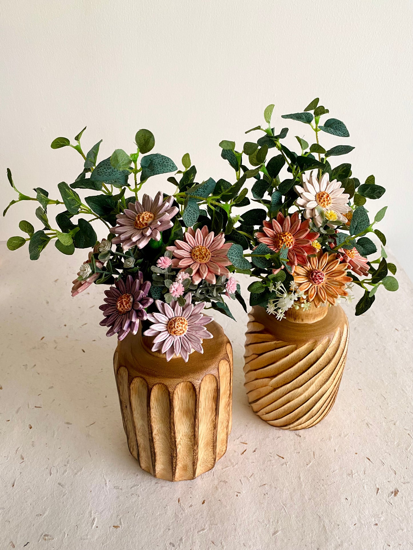 Colorful Daisies in a Wooden Vase